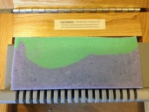 One of the 3 loaves centered on the bar cutter ready to cut into bars.