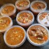 photo of beef and barley stew in plastic containers for freezing