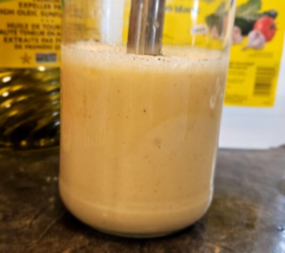 One photo of six in the process to make homemade mayonnaise by owl creek farm